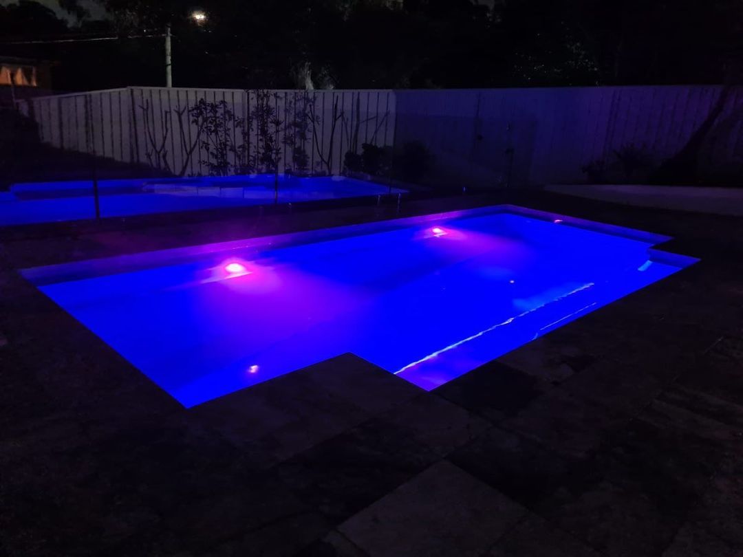 Underground pool lighting within pool